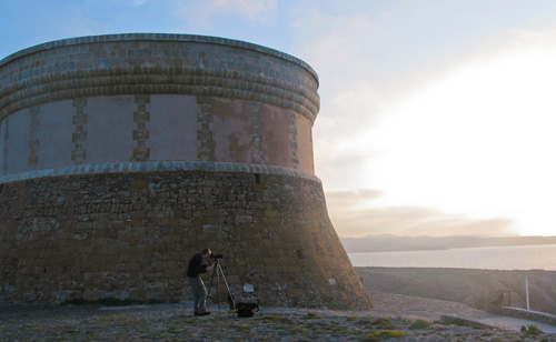 Haydn taking photos at Fornells Tower