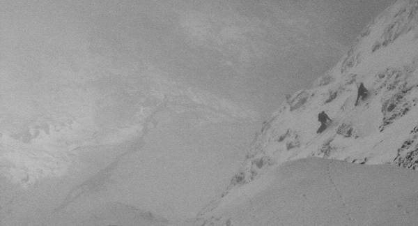 Climbers high above Glaslyn on Left-Hand Trinity (II,*), Snowdon