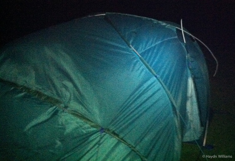 Is it supposed to look like that? We find the limits of the tent at five o'clock in the morning. © Haydn Williams 2011