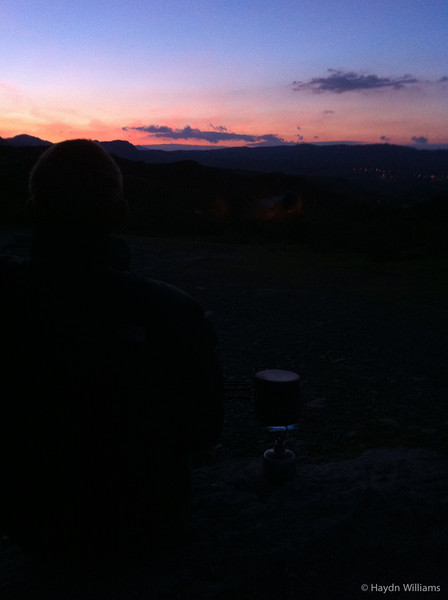 The advantages of a forced early start: watching sunrise over south Snowdonia while the kettle boils. © Haydn Williams 2011