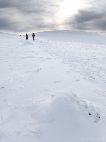 Ben and Matt crossing the plateau towards Ben Macdui. © Haydn Williams 2012