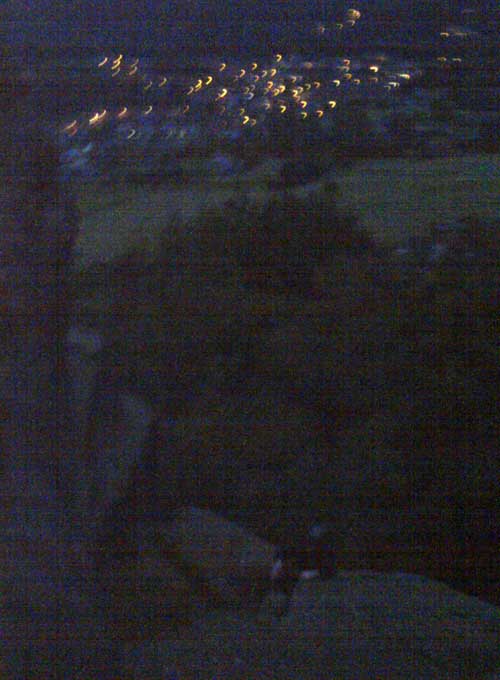 Gareth topping out on a rapidly-darkening "Stonnis Crack" (HS 4b)