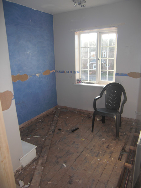 Stripped back study. Note the dado rail shaped holes in the plaster.