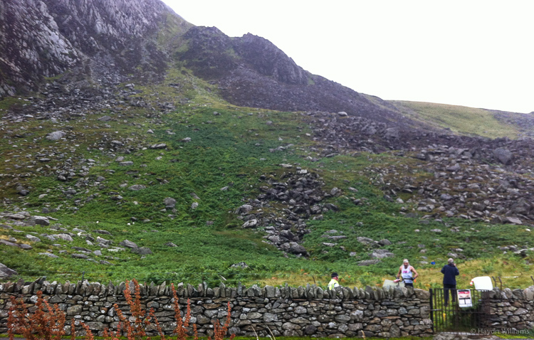 Winner of the Tryfan Downhill Dash 2013 crossing the line. © Haydn Williams 2013