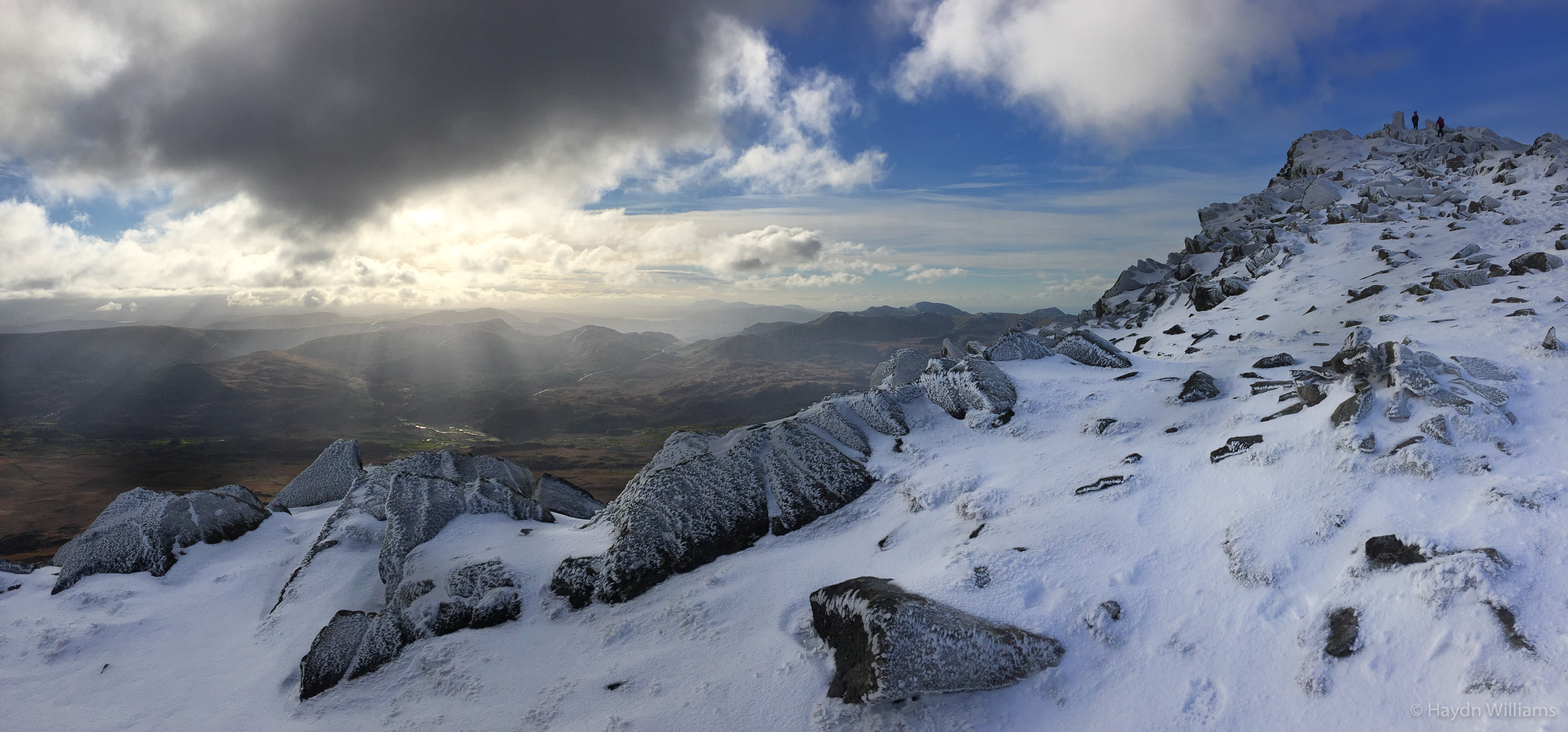 John and Dakotah on the summit of Moel Siabod. Moelwynion in the background. © Haydn Williams 2016