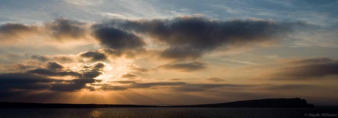 Evening sun over Cap de Cavalleria and lighthouse, Menorca. © Haydn Williams 2008